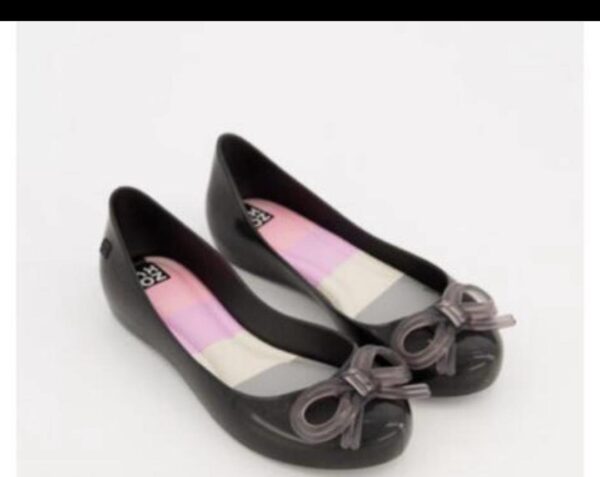 Zaxy black flat shoe with transparent bow tie