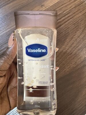 Vaseline cocoa radiant body oil brown cap Dubai