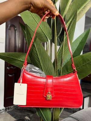 Primark solid light weight padlock croc shape bag in red