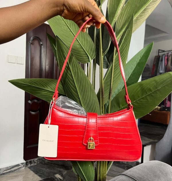 Primark solid light weight padlock croc shape bag in red