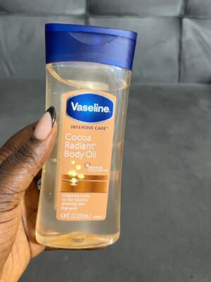 Vaseline cocoa Radiant body oil blue cap usa