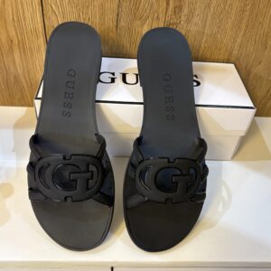 Guess women’s elyho jelly cut out logo flat slippers in black